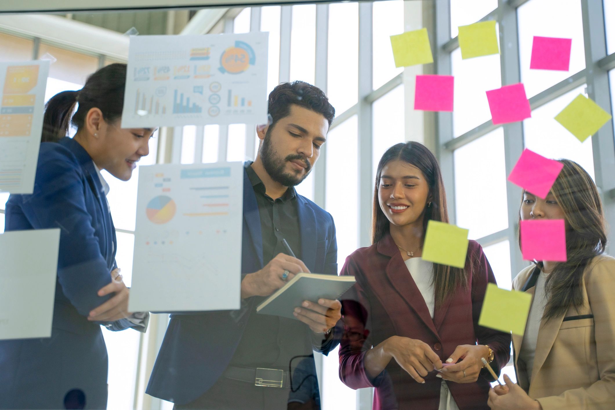 Professionals collaborating in a meeting room on project planning