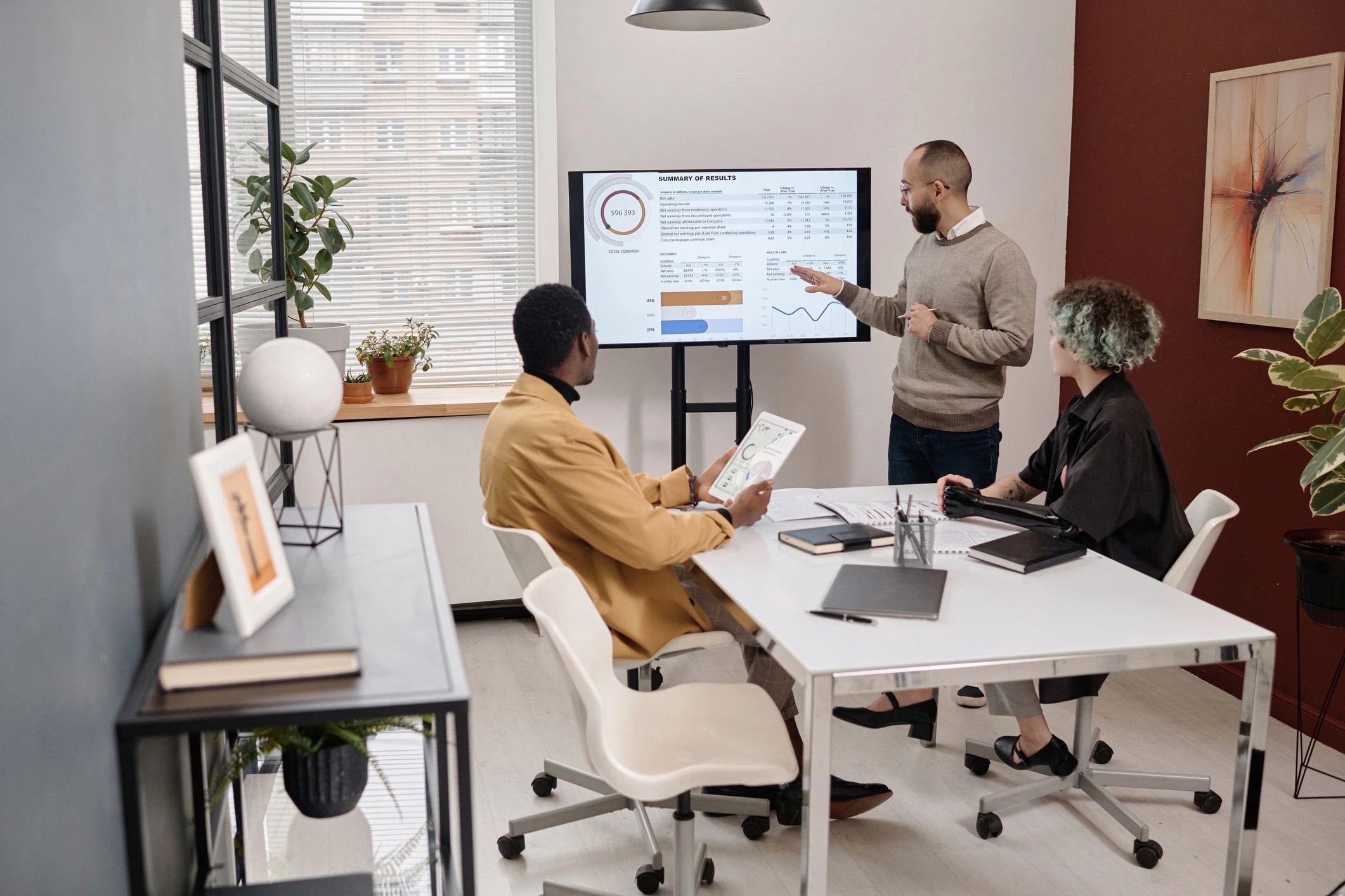 Project team reviewing charts during a planning presentation