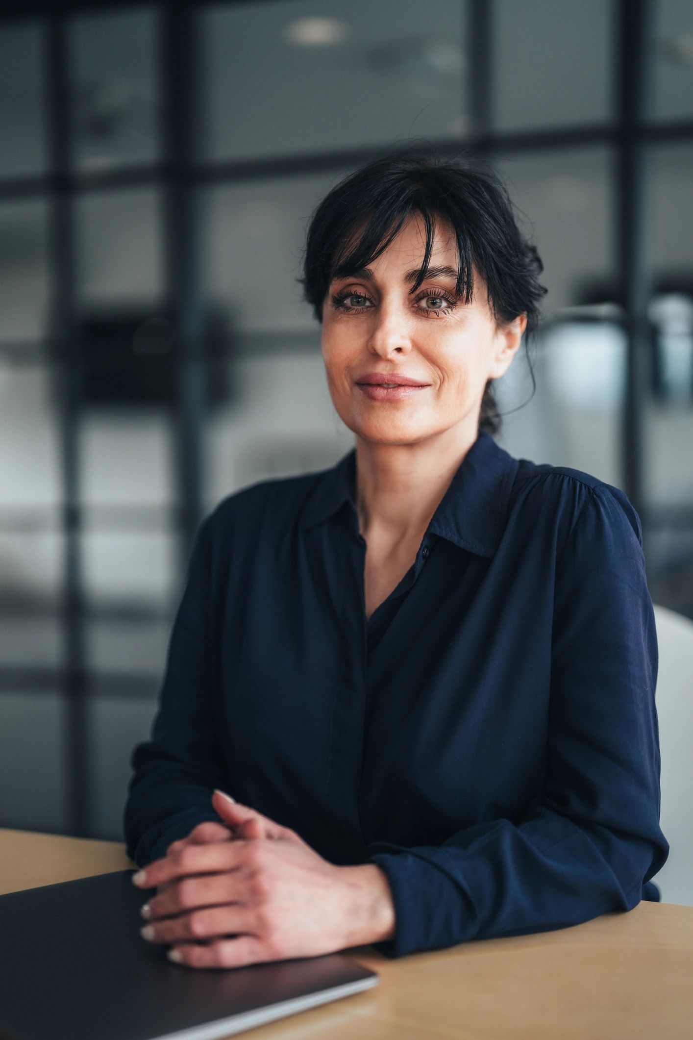 Professional consultant smiling in a modern office